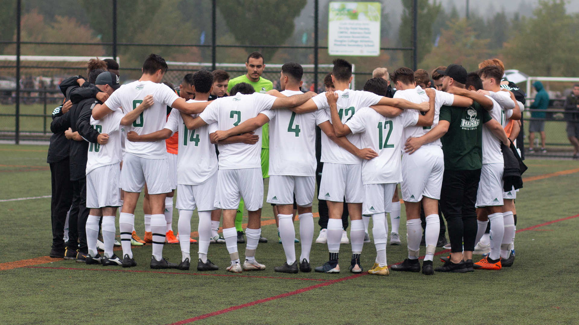 Douglas College Royals 2019-20 men's soccer team huddle