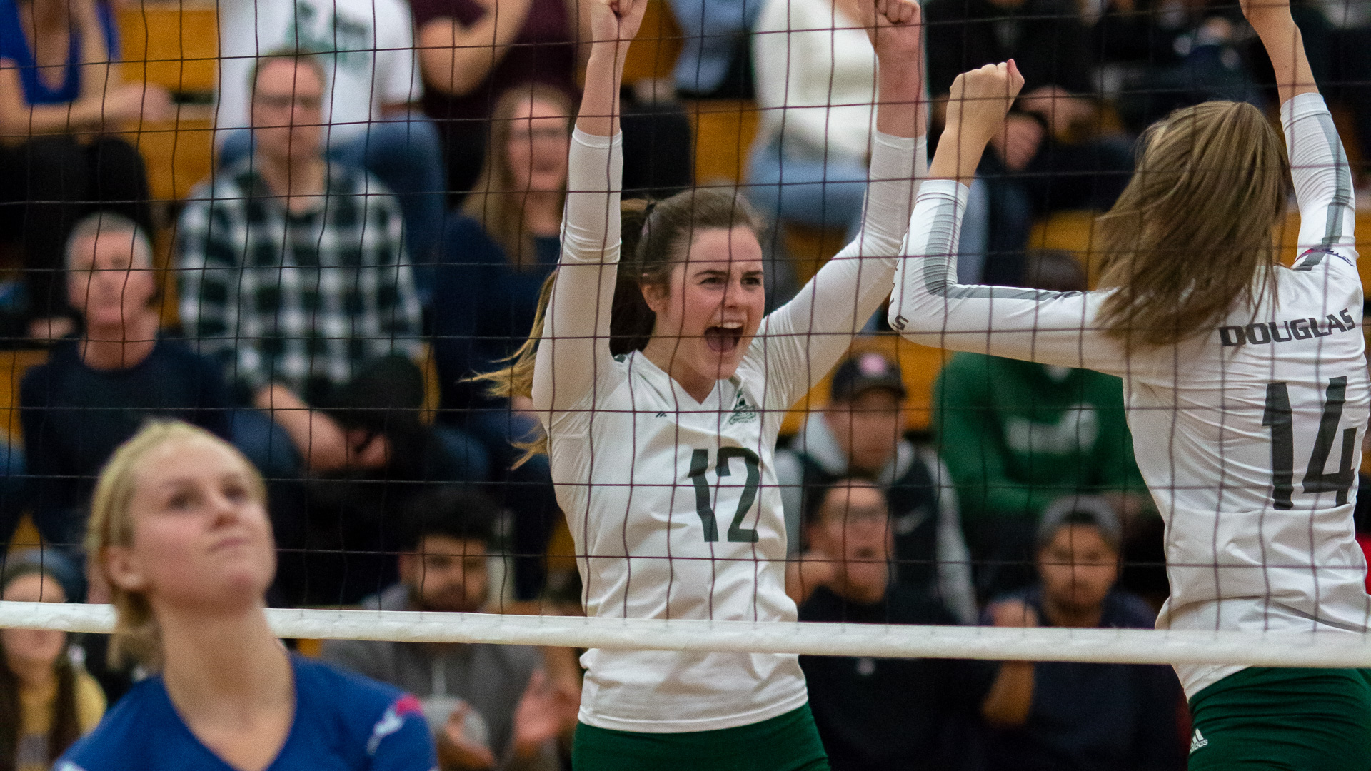 2nd year Outside Hitter Jacey Neid celebrates against the Capilano Blues